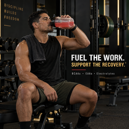 Athlete drinking Amino Thrust during strength training